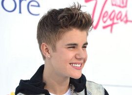 Justin Bieber leva fã para premiação e ganha o título de Melhor Artista Social