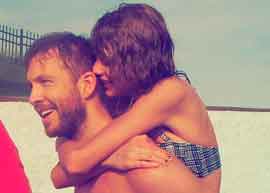 taylor swift e calvin harris abraçados