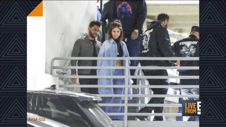 selena de mãos dadas com the weeknd