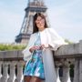 Flavia Pavanelli de vestido com Torre Eiffel ao fundo