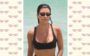 Kourtney Kardashian usando minióculos de sol