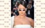 Rihanna usando minióculos de sol