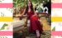 Isabelle Drummond com vestido vermelho sentada